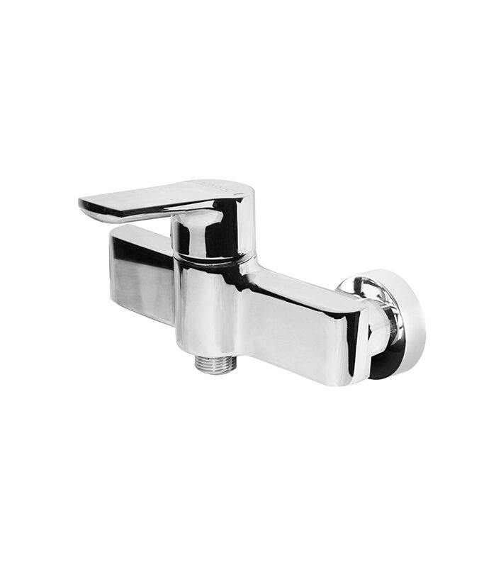 Low-profile chrome mixer from New Art collection installed on a Syrian ceramic basin
