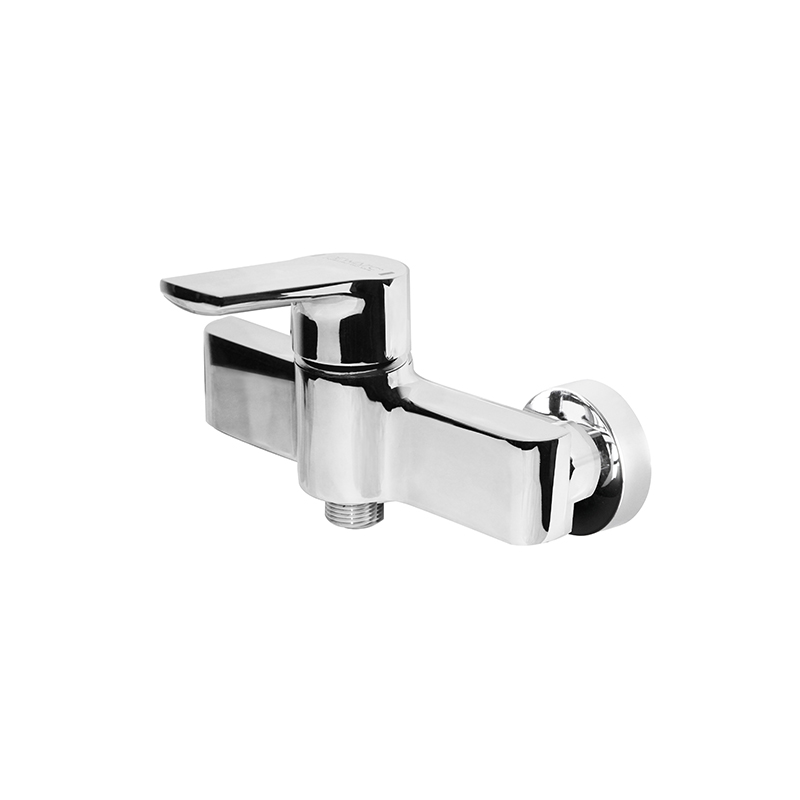 Low-profile chrome mixer from New Art collection installed on a Syrian ceramic basin