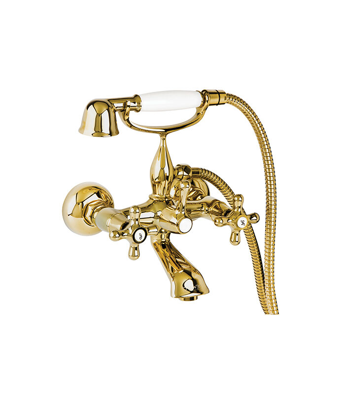 Nostalgic gold mixer tap from Nostalgic series installed on a white ceramic basin in Syria