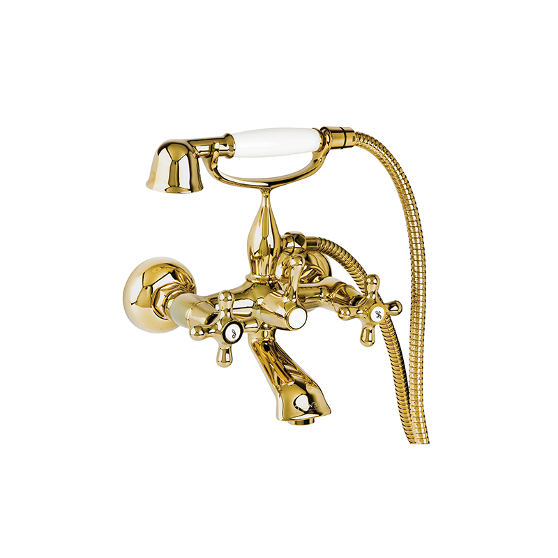 Nostalgic gold mixer tap from Nostalgic series installed on a white ceramic basin in Syria