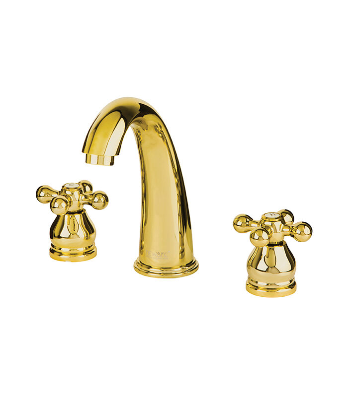 Gold bathroom mixer from Nostalgic collection with vintage design installed on white sink in Syria