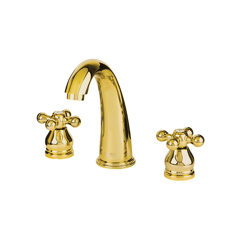 Gold bathroom mixer from Nostalgic collection with vintage design installed on white sink in Syria