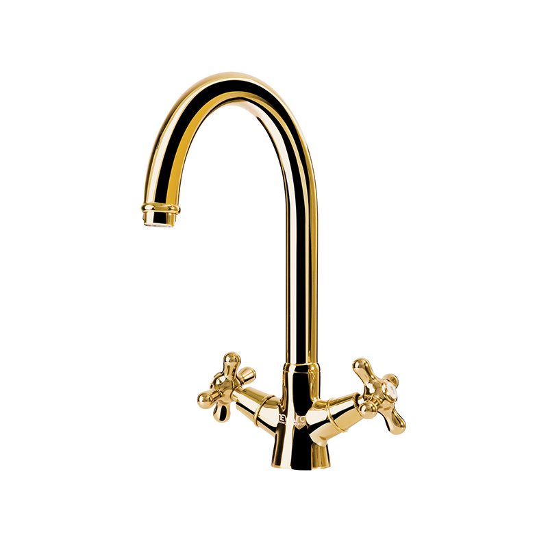Nostalgic gold mixer tap with classic design mounted on ceramic washbasin in Syria
