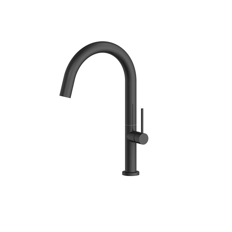 Matte black bold mixer tap with sharp geometric design in Syrian bathroom
