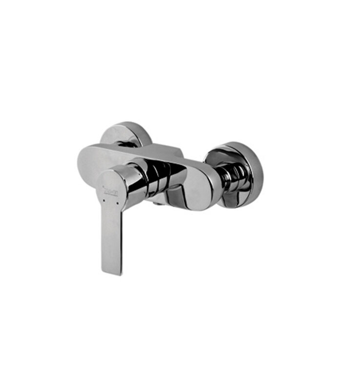 Angled chrome Loft bathroom mixer installed on Syrian sink