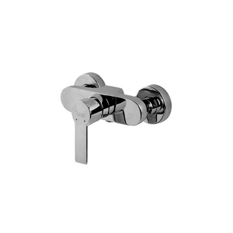 Angled chrome Loft bathroom mixer installed on Syrian sink