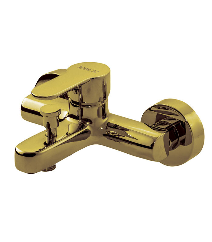 Domino gold mixer tap in use above modern white basin in Syria